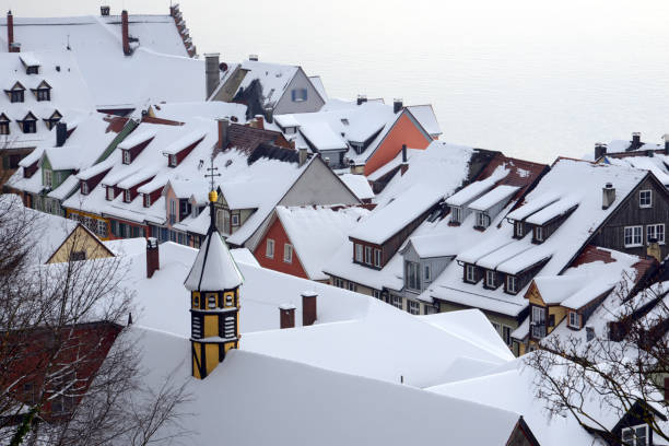 Meersburg, view over the roofs to the Lake Constnce in winter