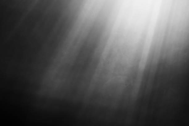 Black and white smoke with light rays