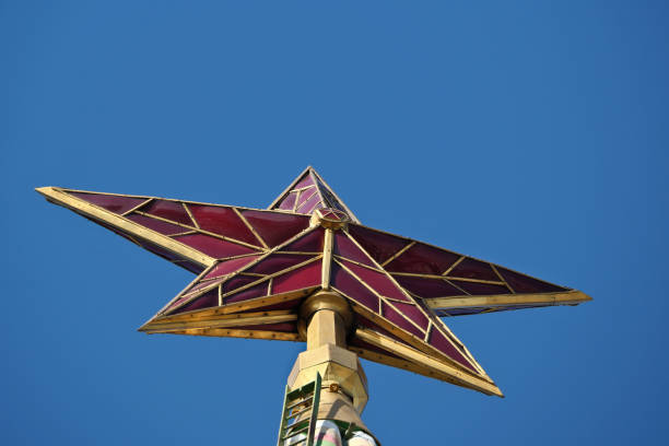 istock Kremlin star. The Ruby Star of the Moscow Kremlin with blue sky in the background. 2180701281