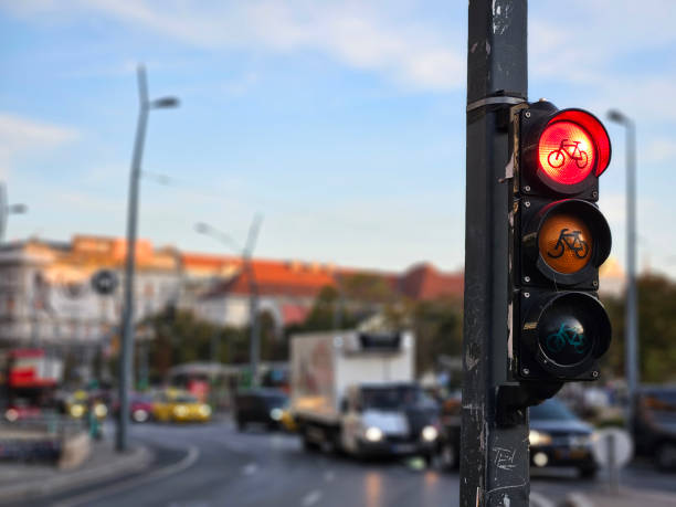 istock Red bicycle traffic light signage with black pole in Europe 2180702316