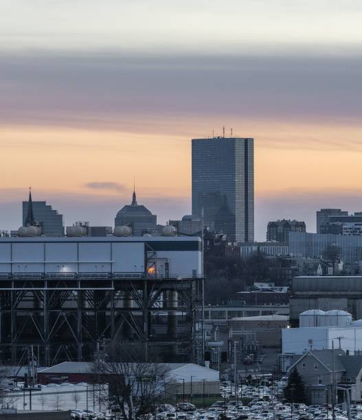 istock Urban cityscape at sunset with skyline and architecture. 2180702709