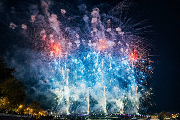 istock Celebration in the city - fireworks at night 2180708624