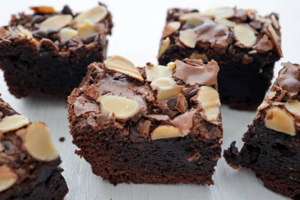 istock Homemade sliced brownie on white background 2180711061