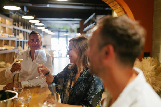 istock Friends tasting wine in a winery 2180711191