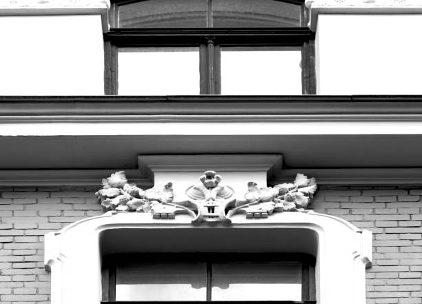 Shot in color detail on the facade of this historic building representing some character, animal or flower. Set at Riga, Letonia, Europe