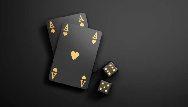 istock Two black casino playing cards with gambling dice 2180715285