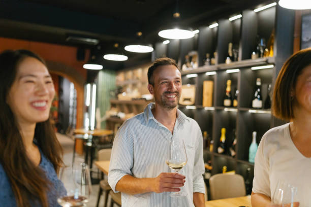 istock Group of friends enjoying wine 2180717289
