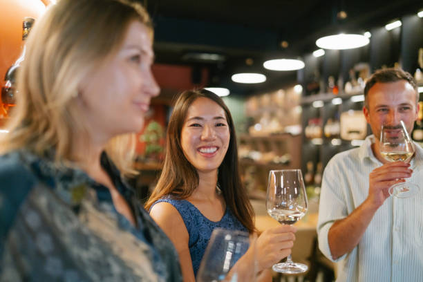 istock Group of friends enjoying wine 2180717310