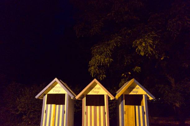 istock Beach huts illuminated at night in Embrun 2180718281