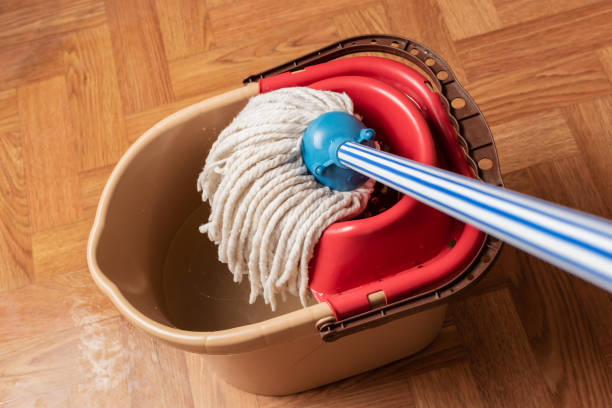 istock Wet mopping, preparation for floor cleaning 2180719464