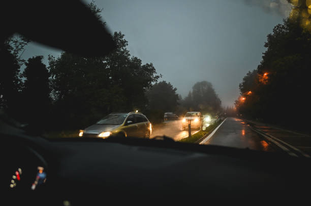 istock street lights on an atmospheric road. 2180730697