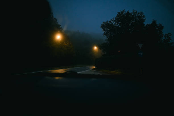 istock fog on the country road 2180730719