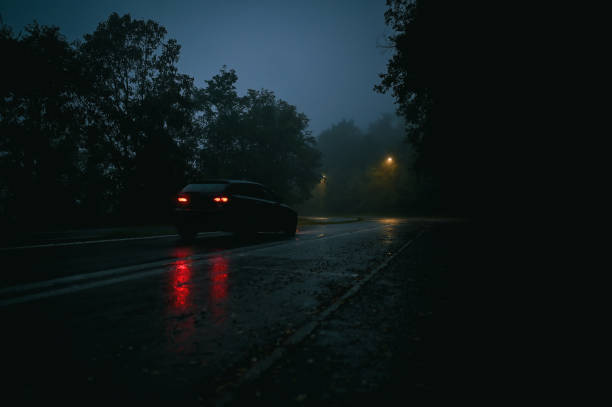istock Spooky night and country road. 2180730775