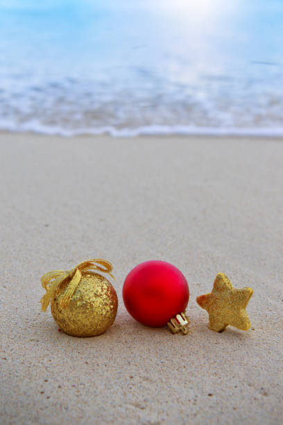 istock Christmas card with colorful decorations on Caribbean beach. 2180731183