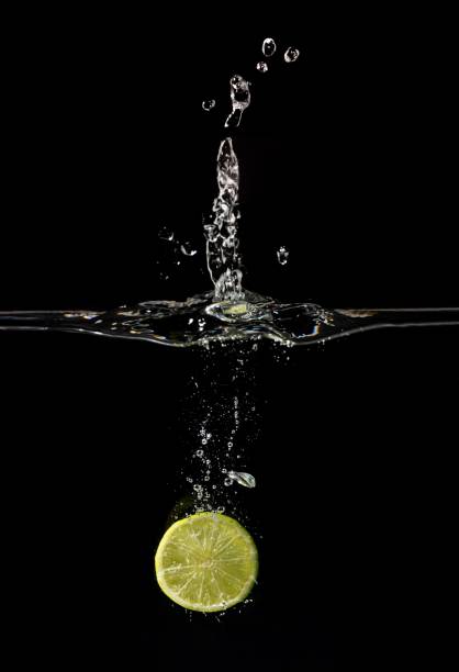 Lime Slice Splashing into Water