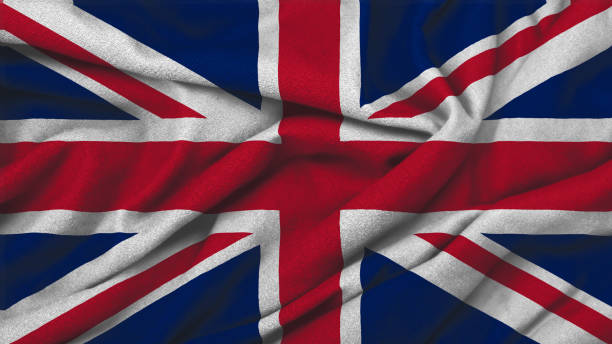 istock United Kingdom national flag on wavy background 2180741098