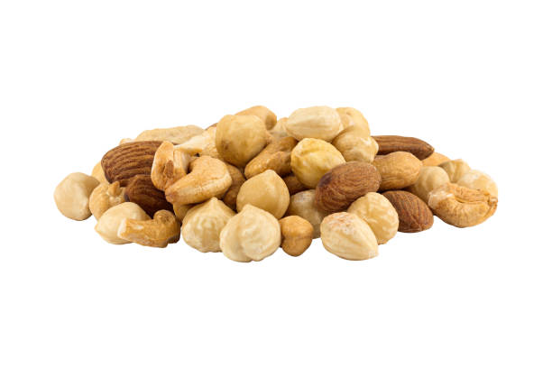istock assorted nuts. Cashew, migdal and hazelnut. Isolated from background 2180742345