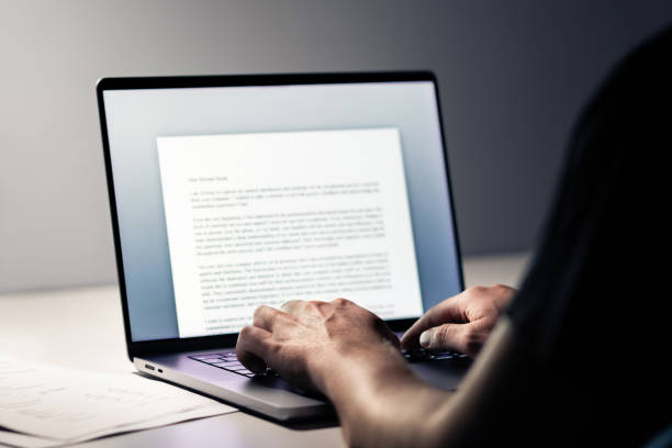 istock Writing blog or content. Writer with laptop computer. Typing letter, article, book, college essay, text document or cv. Business news report. Journalist or editor working. 2180744438