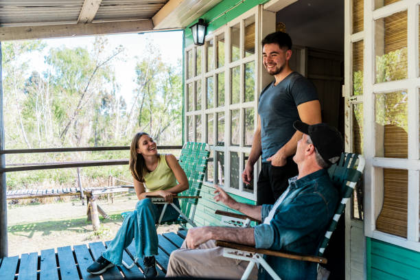 istock Family talking on balcony 2180747491