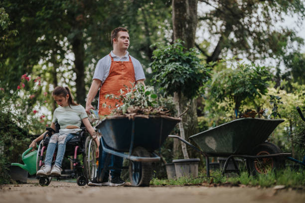 Two people bonding through gardening in a serene park setting