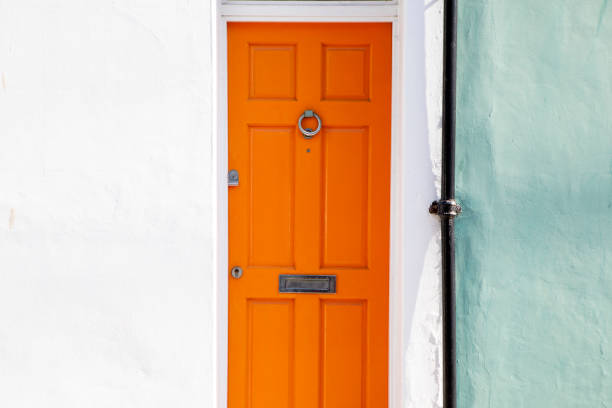 istock Orange coloured door to a townhouse 2180757699