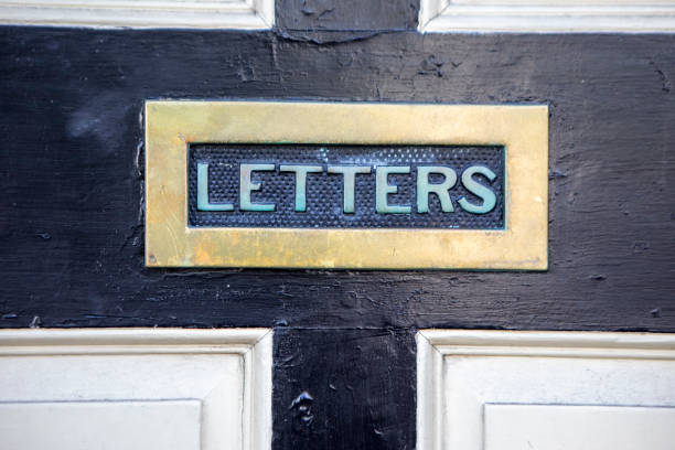 istock Letterbox on a front door to a house 2180757888