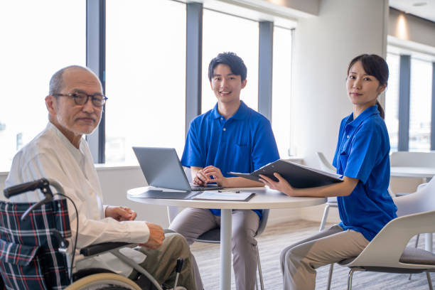 istock Nursing staff and senior man counseling 2180760255