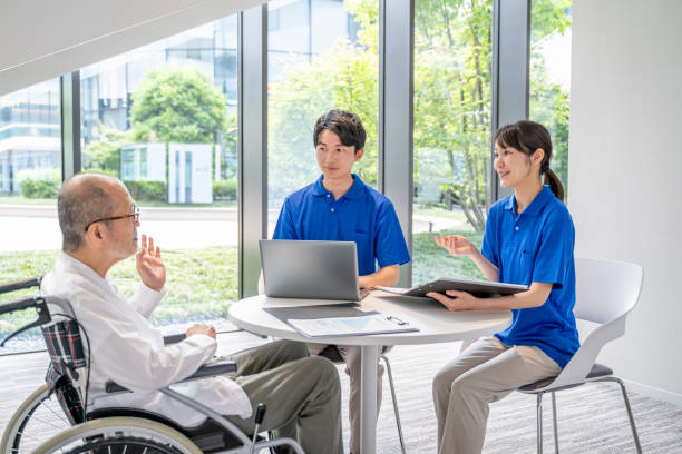 istock Nursing staff and senior man counseling 2180760425