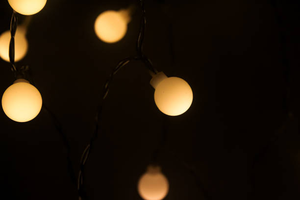 istock ornamental lights that glow in the dark.Lights background. 2180763125