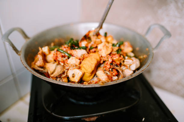 istock A pan-cooked dish featuring tofu, eggs, chilies, and vegetables. 2180766135