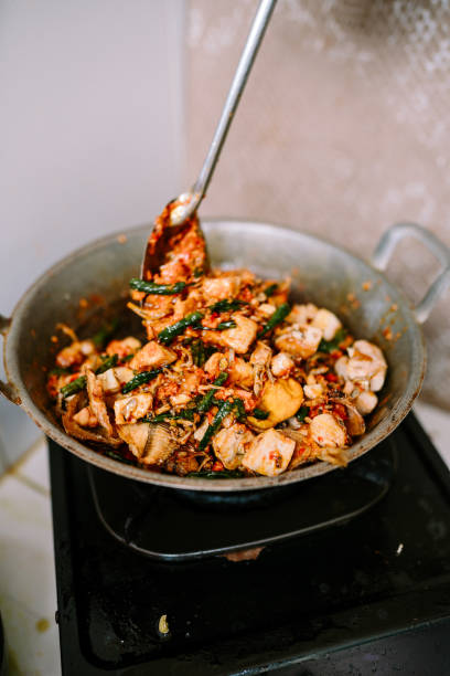 istock A pan-cooked dish featuring tofu, eggs, chilies, and vegetables. 2180766203
