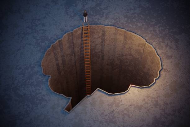 Woman climbing out of brain shaped hole