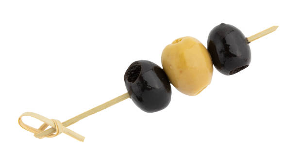 istock black green olives isolated on white 2180772281