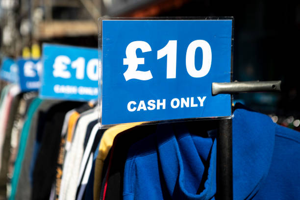 istock Inexpensive clothes outside a store 2180775384