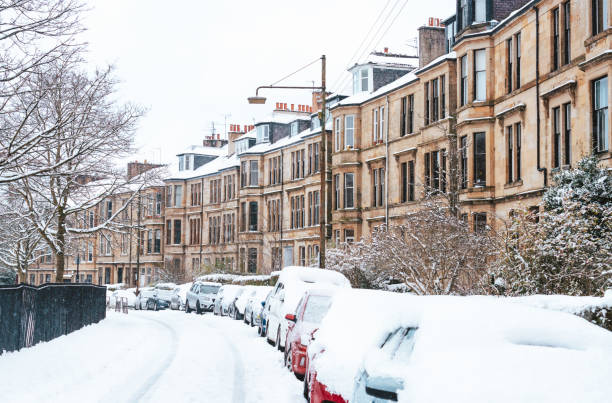 A curving crescent in Hyndland, Glasgow covered in snow.