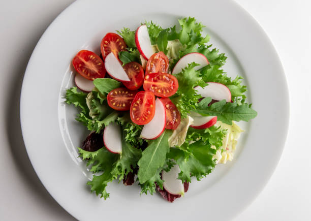istock mixed salad plate with radicchio tomatoes and radishes 2180781083