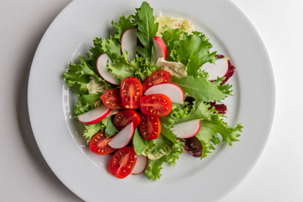 istock mixed salad plate with radicchio tomatoes and radishes 2180781605
