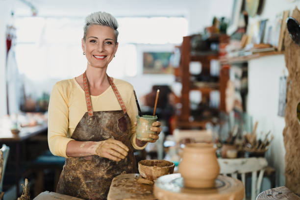 istock Portrait of a happy pottery maker 2180791490