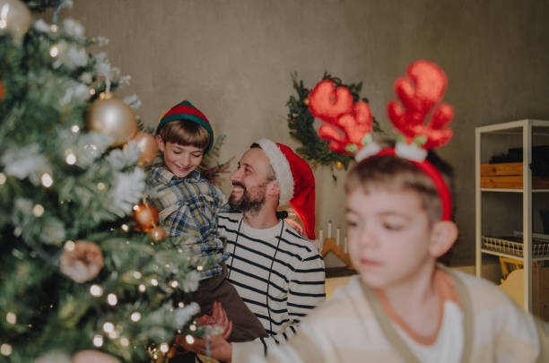 istock Christmas Eve with our dad 2180796264
