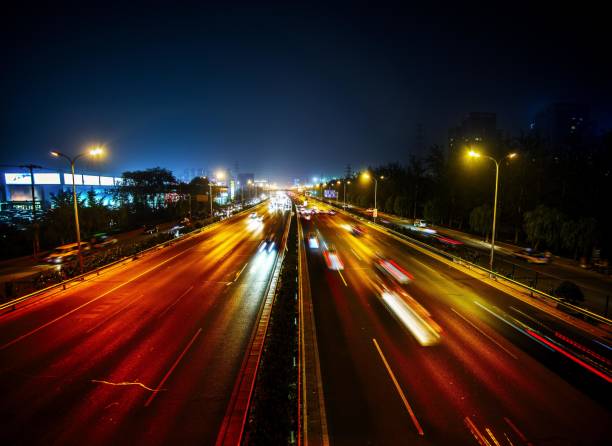 istock Night view of urban expressway with traffic light trails 2180796660