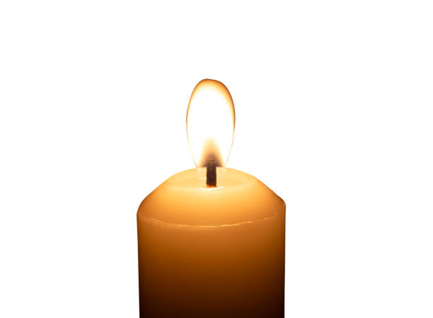 istock A single burning candle flame or light glowing on a big white candle isolated on white background with clipping path 2180804305