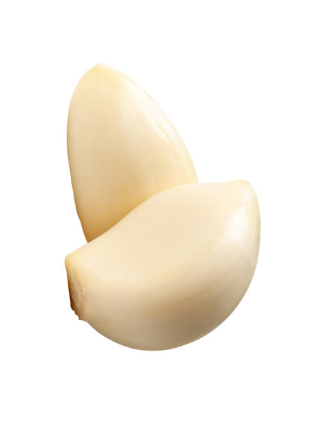 istock Top view of peeled garlic cloves in stack isolated on white background with clipping path 2180806994