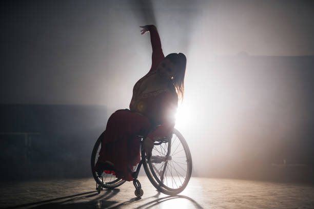 istock Woman with a disability, a para dancer practicing choreography at the dance studio 2180810191