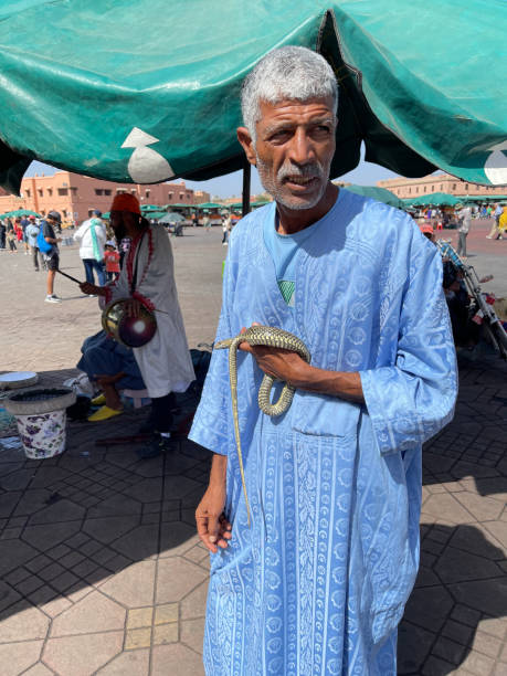 Marrakesh, Morocco October 20, 2023 Marrakesh Medina Man with Cobra
