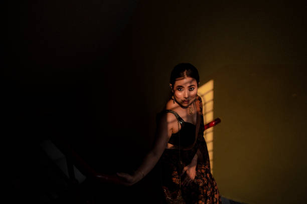 istock Traditional looking lady wearing saree 2180812143