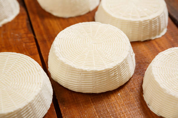 istock Salty soft goat cheese heads 2180814114
