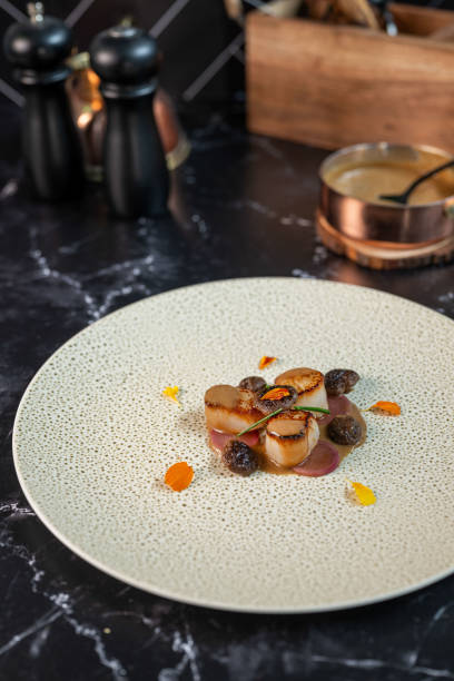 istock Seared Scallops with edible flowers 2180817374