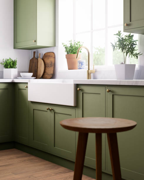 istock 3D render of a modern kitchen with vibrant green cabinets. 2180822121