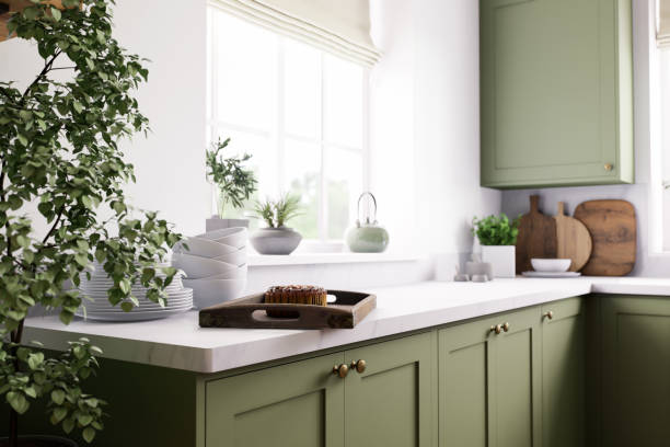 istock Modern green kitchen with natural accents and incredibly stylish decor elements 2180822123