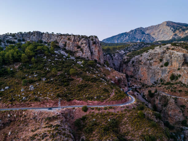 istock Scenic Mountain Road with Breathtaking Cliff View 2180831425